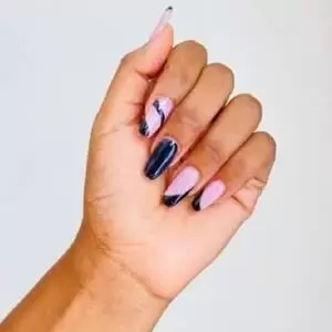 Beautiful long nails after an acrylic manicure with nail art at the client's home in Nairobi